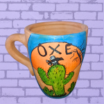 Caneca barro/cerâmica pintada a mão OXE com cacto.